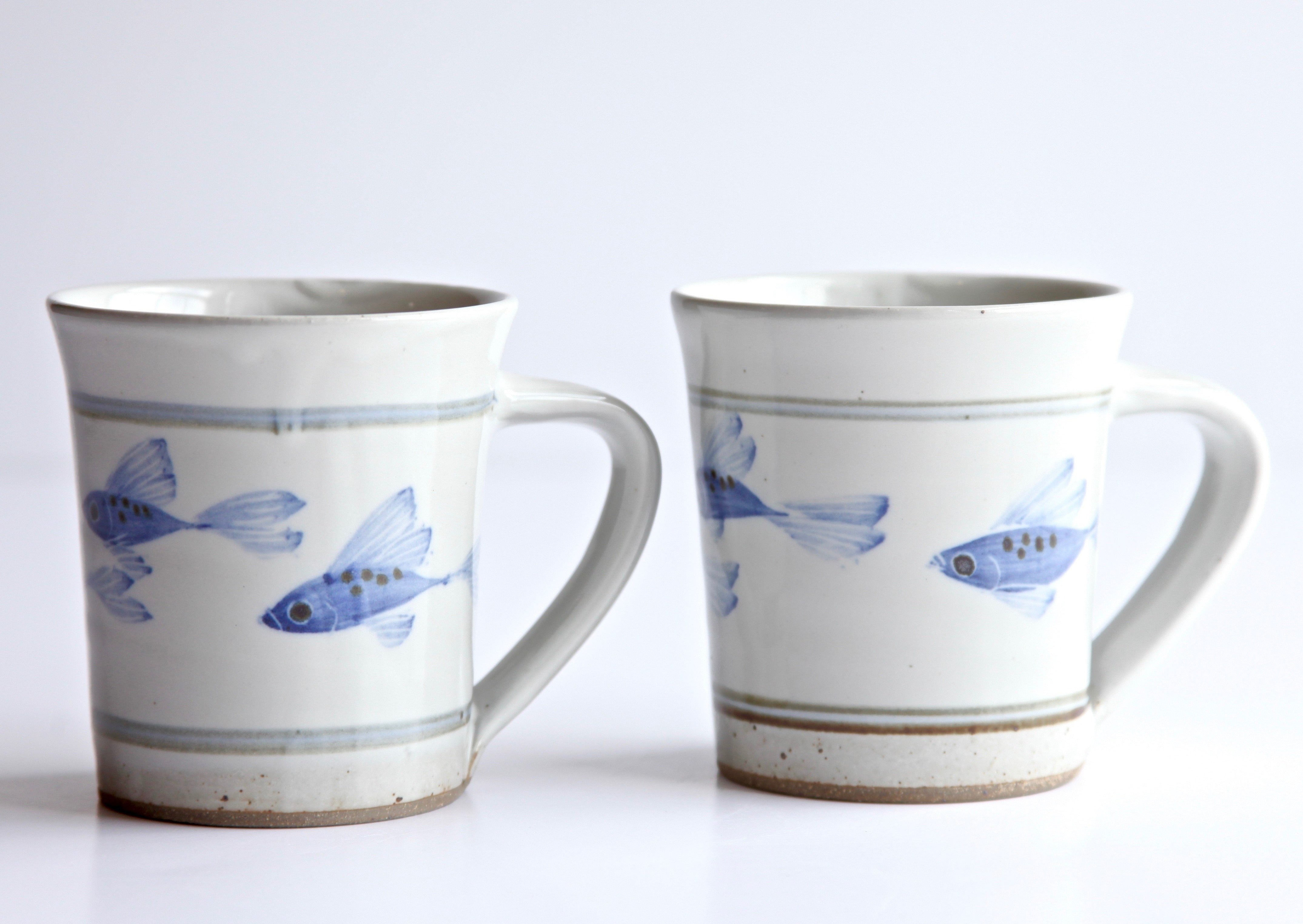 Fishes on a hot mug